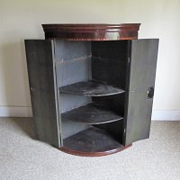 MAHOGANY BOW FRONT HANGING CORNER CUPBOARD