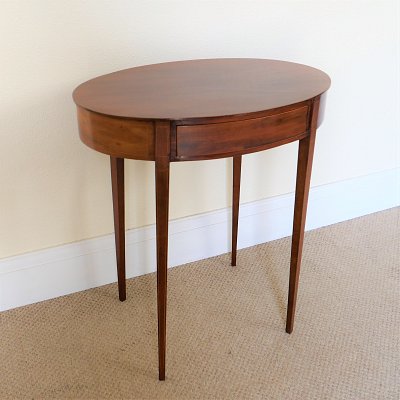 EDWARDIAN MAHOGANY OVAL OCCASIONAL TABLE WITH DRAWER
