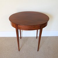 EDWARDIAN MAHOGANY OVAL OCCASIONAL TABLE WITH DRAWER