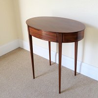 EDWARDIAN MAHOGANY OVAL OCCASIONAL TABLE WITH DRAWER