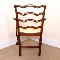 MAHOGANY CHIPPENDALE STYLE LADDERBACK ARMCHAIR