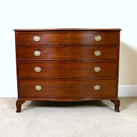 GEORGIAN MAHOGANY SERPENTINE CHEST OF DRAWERS